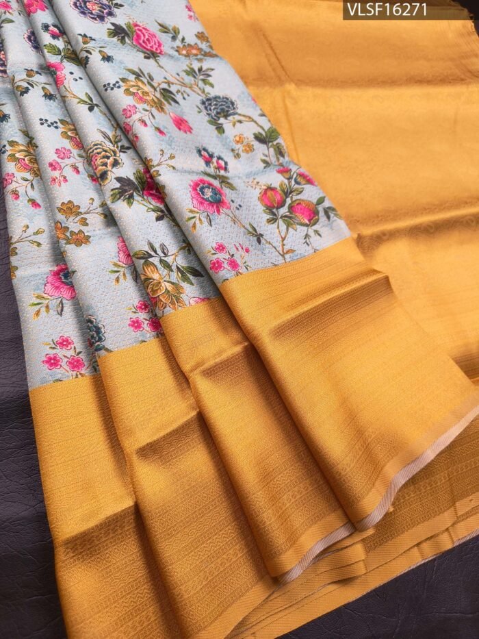 Pastel Blue Coloured Fancy Silk Saree with Floral Motifs and Contrast Border - Image 1