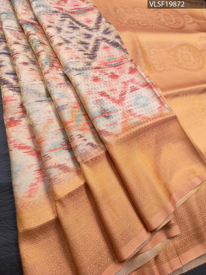 Peach Coloured Fancy Silk Saree with Ikat Pattern and Intricate Zari Woven Border - Image 1