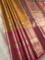 Golden Coloured Tissue Saree with Floral Motifs and Rich Zari Border