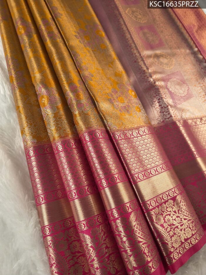 Golden Coloured Tissue Saree with Floral Motifs and Rich Zari Border - Image 1