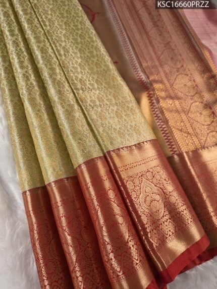 Golden Coloured Tissue Saree with Intricate Motifs and Rich Zari Border