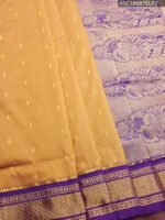 Golden Blended Soft Silk Saree with Subtle Buttas and Rich Purple Brocade Pallu