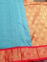 Turquoise Blended Soft Silk Saree with Delicate Motifs and Rich Red Zari Woven Border
