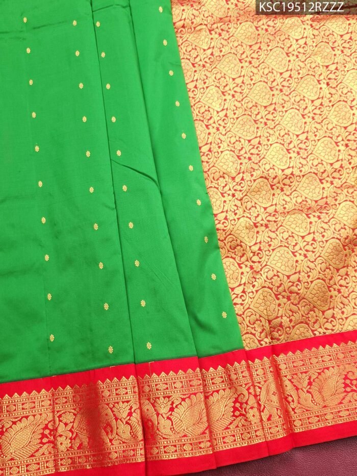 Green Blended Soft Silk Saree with Paisley Motifs, Rich Brocade Pallu, and Zari Peacock Border - Image 1