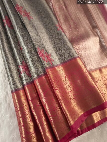 Silver Coloured Tissue Saree with Floral Motifs and Rich Zari Pallu