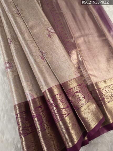 Beige Coloured Tissue Saree with Intricate Floral Motifs and Rich Zari Border