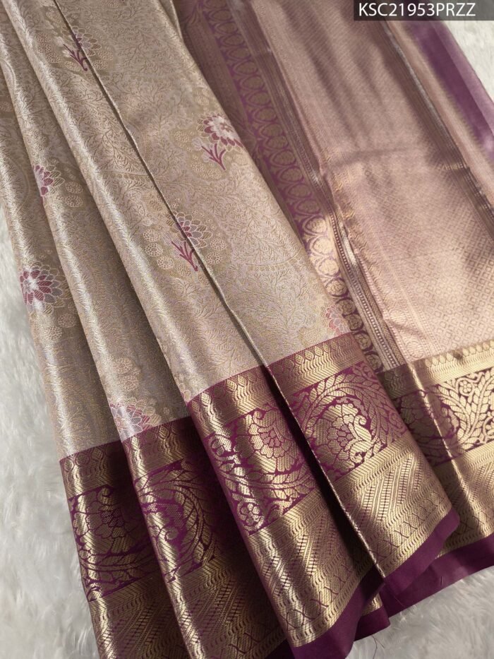 Beige Coloured Tissue Saree with Intricate Floral Motifs and Rich Zari Border - Image 1