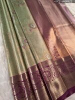 Green and Purple Tissue Saree with Rich Floral Motifs and Intricate Zari Border
