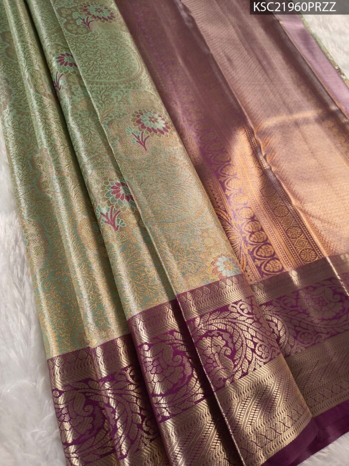 Green and Purple Tissue Saree with Rich Floral Motifs and Intricate Zari Border - Image 1
