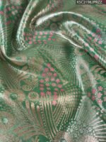 Green and Pink Tissue Saree with Floral Motifs and Rich Zari Border - Image 2