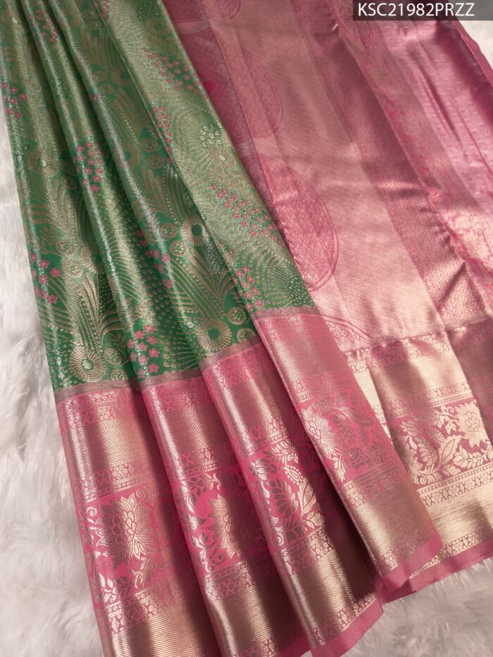 Green and Pink Tissue Saree with Floral Motifs and Rich Zari Border - Image 1