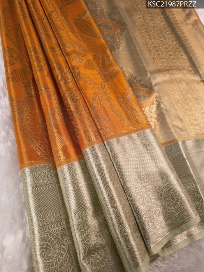 Orange Coloured Tissue Silk Saree with Paisley Motifs and Zari Woven Border - Image 1