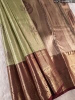 Elegant Green Tissue Saree with Paisley Motifs and Rich Zari Border