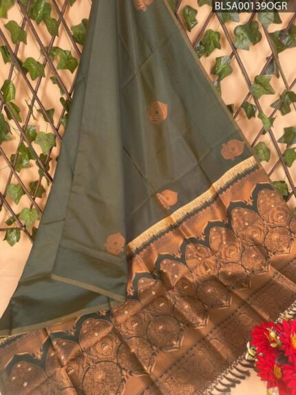 Beautiful Dark Green Semi Soft Silk Saree with Rich Golden Border and Intricate Motifs