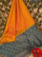 Vibrant Orange and Teal Semi Soft Silk Saree with Circular Motifs and Elegant Border