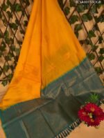 Vibrant Yellow Semi Soft Silk Saree with Beautiful Teal Border and Rich Pallu Design