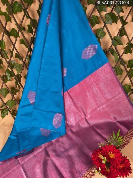 Bright Blue Semi Soft Silk Saree with Pink Border and Geometric Motifs