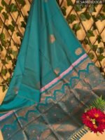 Teal Semi Soft Silk Saree with Intricate Gold Motifs and Pink Pallu