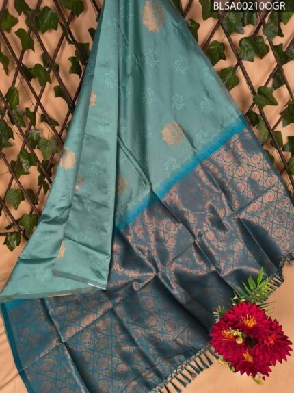 Teal Semi Soft Silk Saree with Rich Floral Motifs and Contrast Blue Border