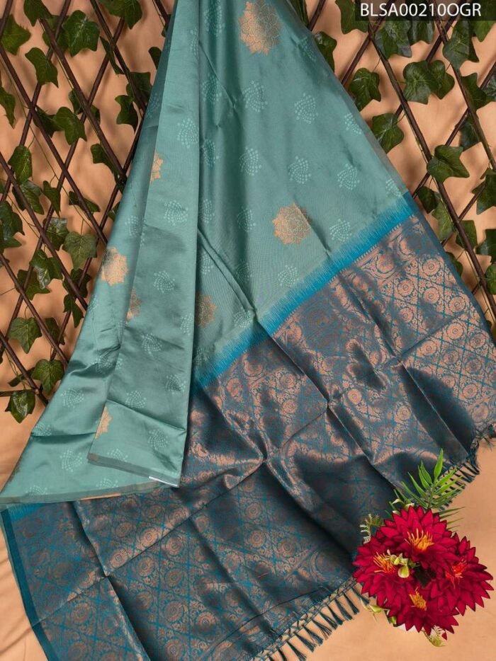 Teal Semi Soft Silk Saree with Rich Floral Motifs and Contrast Blue Border - Image 1